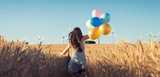 Girl with balloon illustrating Expancel microspheres - light weight fillers and blowing agents in one.