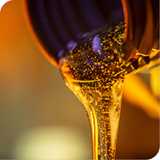 Lubricant oil pouring from spout
