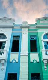 Old classic building with bright green and blue colors