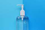 Hand sanitizer on blue background