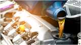 Automotive engine with fuel/oil pouring