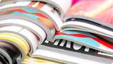 Magazine with colorful printing demonstrating surface treatment properties created by chemistry solutions