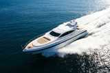 White yacht moving fast  in sea