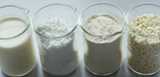 Four product samples in beakers with Expancel unexpanded microspheres used as blowing agents, expanding up to 60 times in volume. 