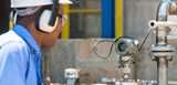 Operator at a chemical plant. Experts can help optimize your process by improving bleaching and chemical efficiency.