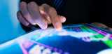 hands on a hand-held device's touch-screen