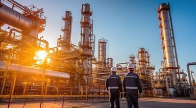 Refinery industry engineer are working and discussing at front of industrial factory