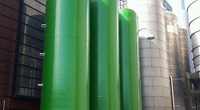 Green silos on production site