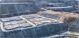 Mining operations showing solvent extraction, leaching heaps and storage reservoirs