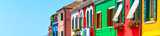 Street of colorful houses at a canal street. Dispersants and wetting agents are key additives to produce high quality colorants with good stability and color acceptance. 
