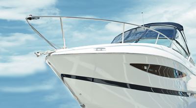 A close-up view of the front of a white yacht