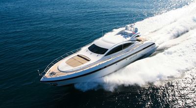 White yacht moving fast  in sea