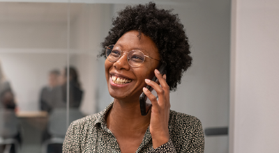 Nouryon employee smiling while on the phone