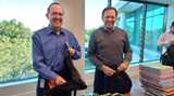 Nouryon employees filling backpacks with essential school supplies
