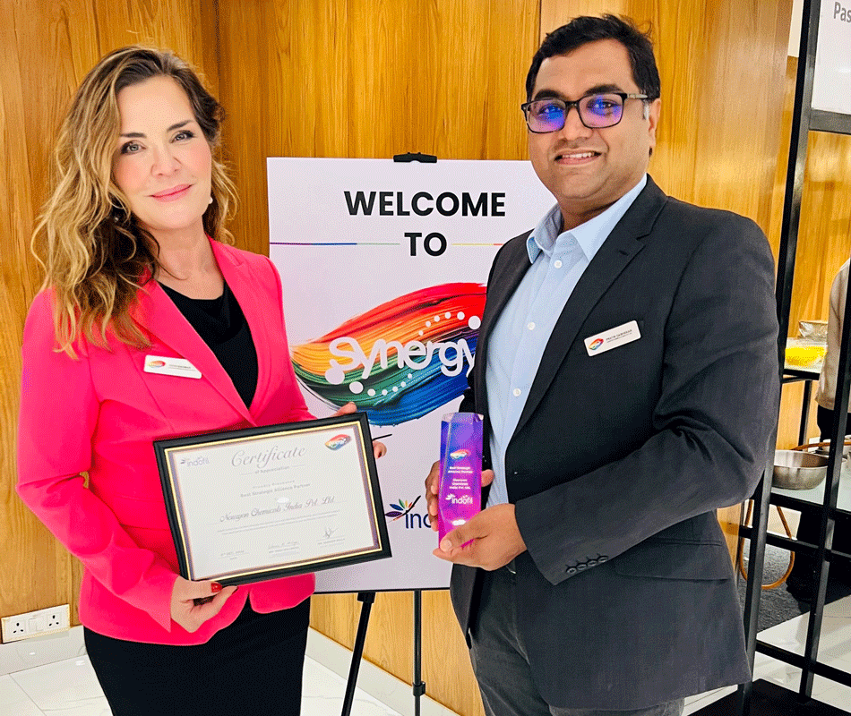 Sirpa Engman and Pratik Dabhekar with the award