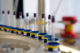Close-up of a Nuclear Magnetic Resonance (NMR) autosampler used in chemical analysis—part of Nouryon’s high-precision lab instrumentation.
